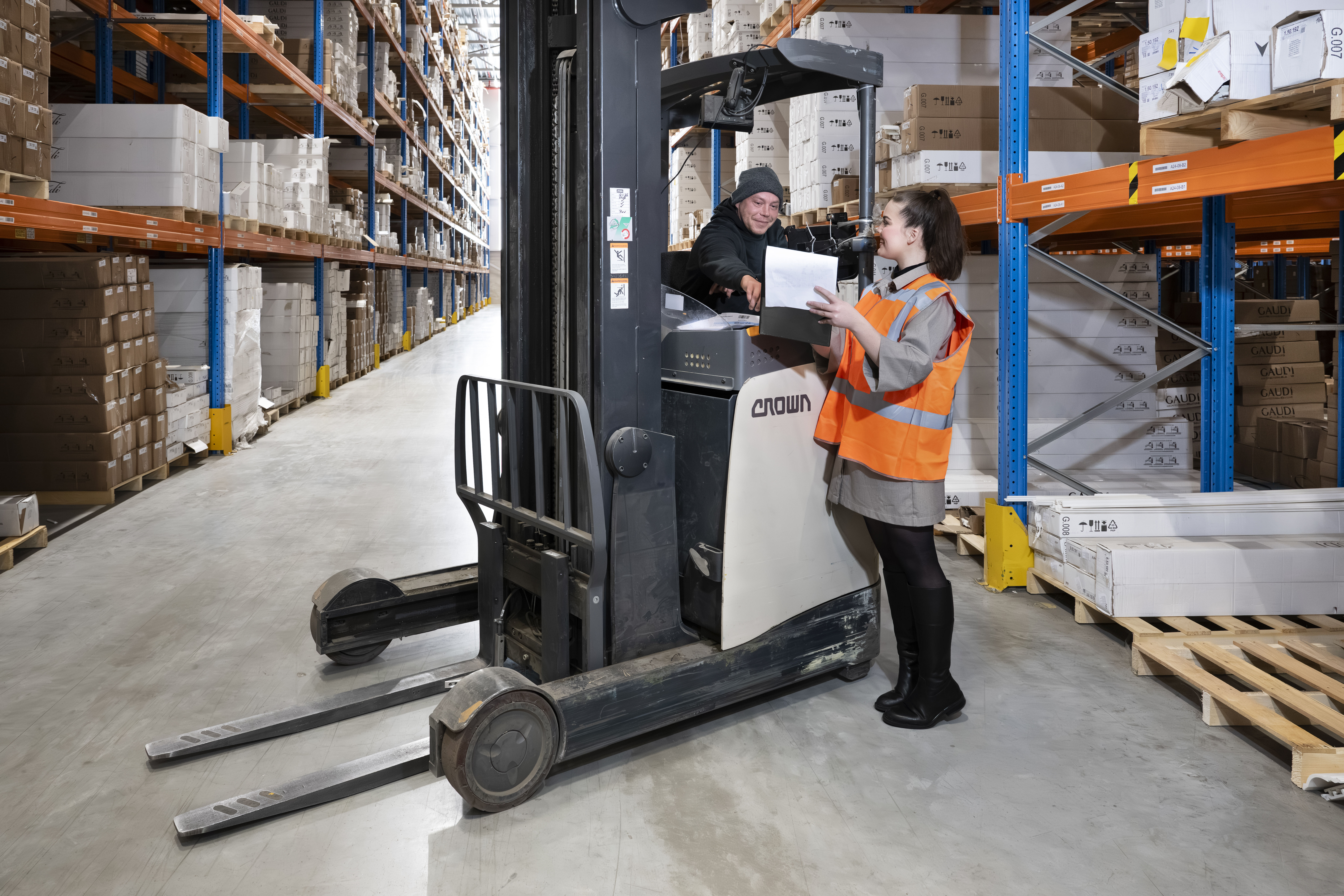 Employee handling inventory in a structured logistics operation