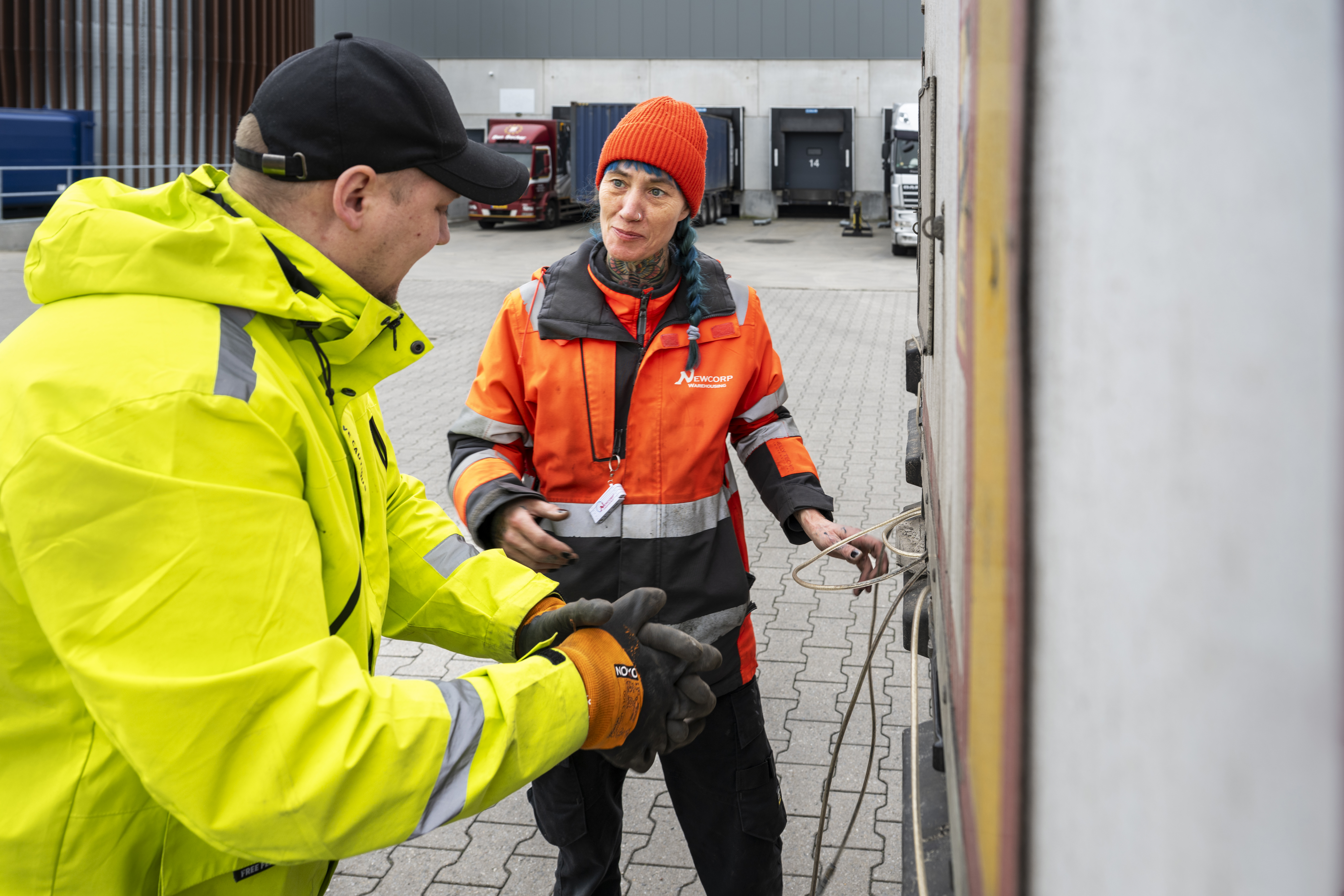Close-up of hands-on logistics work handling goods and shipments